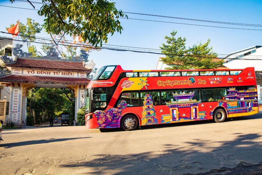 Hue: City Sightseeing Hop-On Hop-Off Bus Tour - Pilgrimage Village, An Hien Garden House, and the stops that add variety