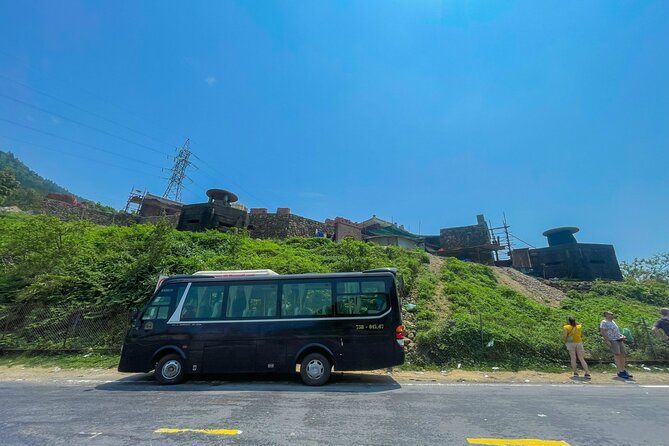 Hue Hoi An Bus Tour Sightseeing via Hai Van Pass 4 Stops - Stop 1: Thanh Toan Tile Bridge—wood arch meets tiled roof