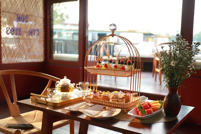 Huong River Afternoon Tea Cruise Tour Along Hue City - Trường Tiền Bridge, Quốc Học High School, and the colonial architecture you’ll spot from the water