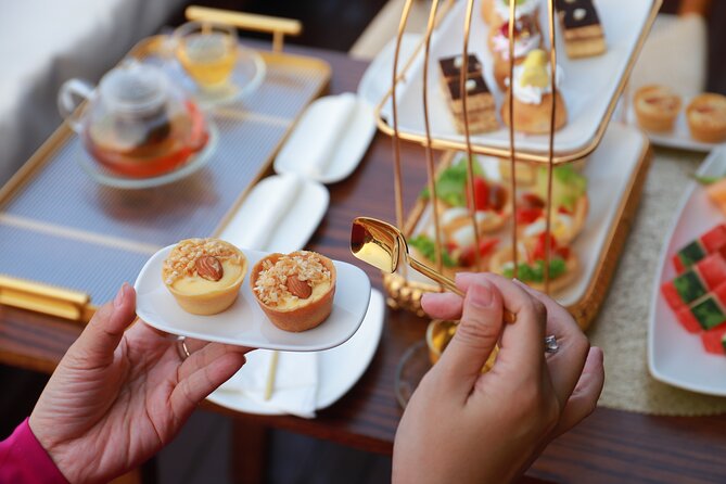 Huong River Afternoon Tea Cruise Tour Along Hue City - Boat comfort that matters: open sides, air-conditioning, and a small cap of 30