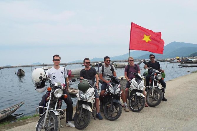 Motorbike Experience Hue to Hoi An Over Via Hai Van pass with Amazing Easy Rider - Stop 2: Elephant Springs waterfall break, jumping into cool water, and Huda beer