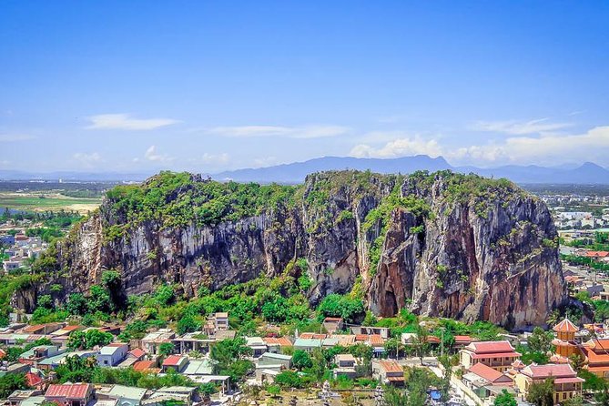 Top Gear with EasyRider Hue to Hoi An or Hoi An to Hue - Marble Mountains and Danang’s Dragon Bridge finish